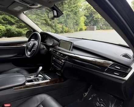 Чорний БМВ Х5, об'ємом двигуна 3 л та пробігом 75 тис. км за 25000 $, фото 13 на Automoto.ua