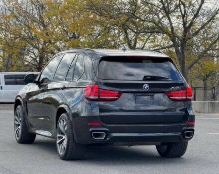 Чорний БМВ Х5, об'ємом двигуна 3 л та пробігом 71 тис. км за 15000 $, фото 6 на Automoto.ua