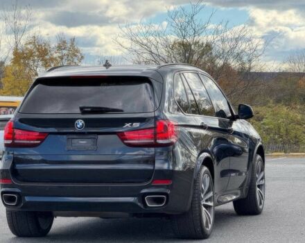 Чорний БМВ Х5, об'ємом двигуна 3 л та пробігом 71 тис. км за 15000 $, фото 4 на Automoto.ua