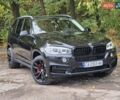 Чорний БМВ Х5, об'ємом двигуна 2 л та пробігом 204 тис. км за 29900 $, фото 1 на Automoto.ua