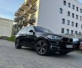 Черный БМВ Х5, объемом двигателя 2 л и пробегом 150 тыс. км за 28059 $, фото 29 на Automoto.ua