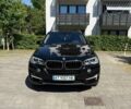 Черный БМВ Х5, объемом двигателя 2 л и пробегом 150 тыс. км за 28059 $, фото 1 на Automoto.ua