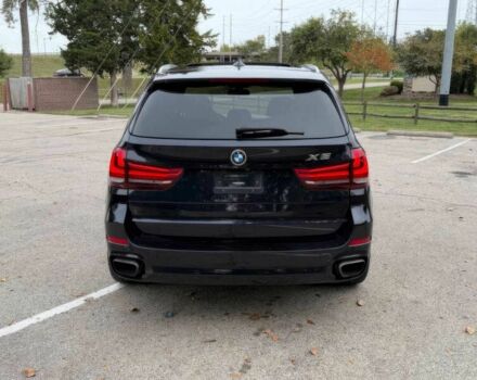 Черный БМВ Х5, объемом двигателя 4.4 л и пробегом 73 тыс. км за 18000 $, фото 6 на Automoto.ua