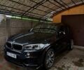 Черный БМВ Х5, объемом двигателя 3 л и пробегом 209 тыс. км за 32900 $, фото 1 на Automoto.ua