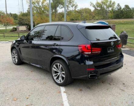 Черный БМВ Х5, объемом двигателя 4.4 л и пробегом 73 тыс. км за 18000 $, фото 7 на Automoto.ua