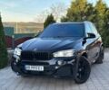 Черный БМВ Х5, объемом двигателя 3 л и пробегом 240 тыс. км за 38500 $, фото 1 на Automoto.ua