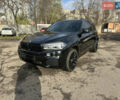 Черный БМВ Х5, объемом двигателя 3 л и пробегом 99 тыс. км за 24900 $, фото 1 на Automoto.ua
