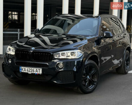 Черный БМВ Х5, объемом двигателя 3 л и пробегом 128 тыс. км за 36500 $, фото 1 на Automoto.ua