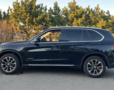 Черный БМВ Х5, объемом двигателя 3 л и пробегом 147 тыс. км за 17500 $, фото 1 на Automoto.ua