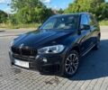 Черный БМВ Х5, объемом двигателя 3 л и пробегом 150 тыс. км за 25000 $, фото 1 на Automoto.ua
