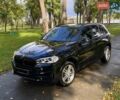 Чорний БМВ Х5, об'ємом двигуна 2 л та пробігом 202 тис. км за 23800 $, фото 1 на Automoto.ua