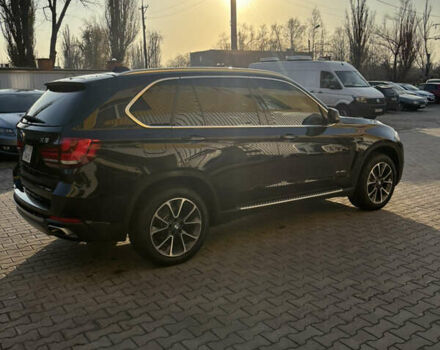 Черный БМВ Х5, объемом двигателя 2 л и пробегом 258 тыс. км за 25500 $, фото 4 на Automoto.ua