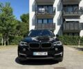 Черный БМВ Х5, объемом двигателя 2 л и пробегом 150 тыс. км за 28059 $, фото 1 на Automoto.ua