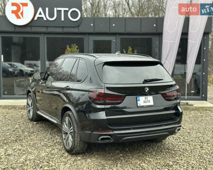 Чорний БМВ Х5, об'ємом двигуна 2 л та пробігом 189 тис. км за 24500 $, фото 2 на Automoto.ua