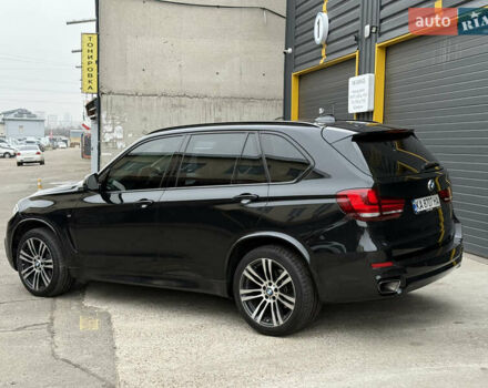 Чорний БМВ Х5, об'ємом двигуна 2 л та пробігом 214 тис. км за 29500 $, фото 2 на Automoto.ua