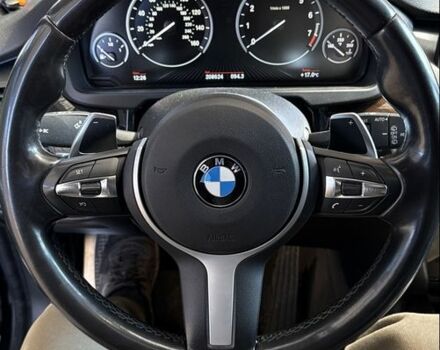 Черный БМВ Х5, объемом двигателя 3 л и пробегом 209 тыс. км за 29900 $, фото 1 на Automoto.ua