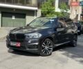 Черный БМВ Х5, объемом двигателя 3 л и пробегом 118 тыс. км за 24990 $, фото 1 на Automoto.ua
