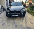 Черный БМВ Х5, объемом двигателя 2 л и пробегом 210 тыс. км за 26000 $, фото 1 на Automoto.ua