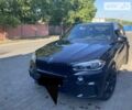 Чорний БМВ Х5, об'ємом двигуна 3 л та пробігом 105 тис. км за 45500 $, фото 1 на Automoto.ua