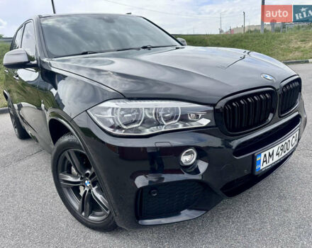 Черный БМВ Х5, объемом двигателя 3 л и пробегом 240 тыс. км за 33700 $, фото 2 на Automoto.ua