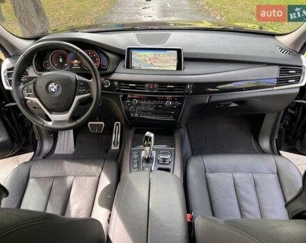 Чорний БМВ Х5, об'ємом двигуна 2 л та пробігом 202 тис. км за 23800 $, фото 1 на Automoto.ua