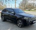 Чорний БМВ Х5, об'ємом двигуна 3 л та пробігом 130 тис. км за 50500 $, фото 1 на Automoto.ua