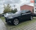 Черный БМВ Х5, объемом двигателя 2 л и пробегом 150 тыс. км за 28059 $, фото 37 на Automoto.ua