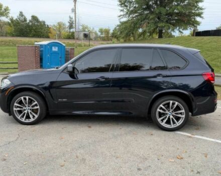 Черный БМВ Х5, объемом двигателя 4.4 л и пробегом 73 тыс. км за 18000 $, фото 4 на Automoto.ua