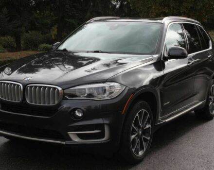 Черный БМВ Х5, объемом двигателя 3 л и пробегом 71 тыс. км за 6200 $, фото 2 на Automoto.ua