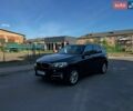 Черный БМВ Х5, объемом двигателя 2 л и пробегом 187 тыс. км за 23199 $, фото 1 на Automoto.ua