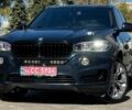 Чорний БМВ Х5, об'ємом двигуна 2 л та пробігом 221 тис. км за 26700 $, фото 1 на Automoto.ua