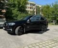 Черный БМВ Х5, объемом двигателя 2 л и пробегом 150 тыс. км за 28059 $, фото 2 на Automoto.ua
