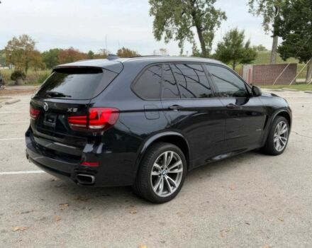 Черный БМВ Х5, объемом двигателя 4.4 л и пробегом 73 тыс. км за 18000 $, фото 5 на Automoto.ua
