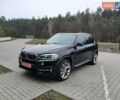 Черный БМВ Х5, объемом двигателя 2 л и пробегом 143 тыс. км за 29500 $, фото 1 на Automoto.ua