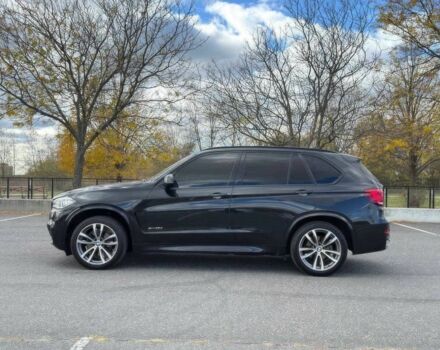 Чорний БМВ Х5, об'ємом двигуна 3 л та пробігом 71 тис. км за 15000 $, фото 3 на Automoto.ua