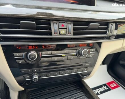 Чорний БМВ Х5, об'ємом двигуна 3 л та пробігом 110 тис. км за 28490 $, фото 28 на Automoto.ua