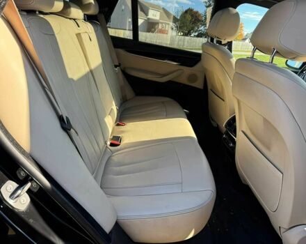 Чорний БМВ Х5, об'ємом двигуна 3 л та пробігом 64 тис. км за 17000 $, фото 13 на Automoto.ua