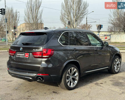 Чорний БМВ Х5, об'ємом двигуна 3 л та пробігом 110 тис. км за 28490 $, фото 4 на Automoto.ua