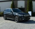 Черный БМВ Х5, объемом двигателя 3 л и пробегом 56 тыс. км за 22000 $, фото 1 на Automoto.ua