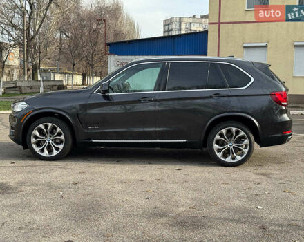 Чорний БМВ Х5, об'ємом двигуна 3 л та пробігом 110 тис. км за 28490 $, фото 1 на Automoto.ua