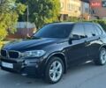 Чорний БМВ Х5, об'ємом двигуна 2 л та пробігом 95 тис. км за 32500 $, фото 1 на Automoto.ua