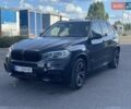 Чорний БМВ Х5, об'ємом двигуна 2 л та пробігом 195 тис. км за 33200 $, фото 1 на Automoto.ua