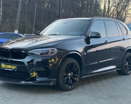 Черный БМВ Х5, объемом двигателя 3 л и пробегом 73 тыс. км за 45500 $, фото 2 на Automoto.ua
