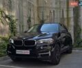 Чорний БМВ Х5, об'ємом двигуна 2 л та пробігом 148 тис. км за 29699 $, фото 1 на Automoto.ua