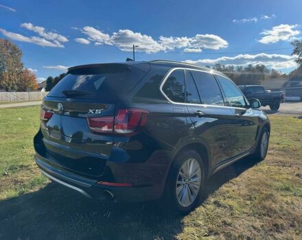 Чорний БМВ Х5, об'ємом двигуна 3 л та пробігом 64 тис. км за 17000 $, фото 4 на Automoto.ua