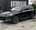 Черный БМВ Х5, объемом двигателя 3 л и пробегом 236 тыс. км за 26999 $, фото 1 на Automoto.ua