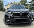 Чорний БМВ Х5, об'ємом двигуна 2 л та пробігом 145 тис. км за 21000 $, фото 1 на Automoto.ua