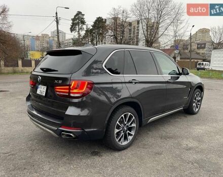 Черный БМВ Х5, объемом двигателя 2 л и пробегом 142 тыс. км за 25000 $, фото 1 на Automoto.ua