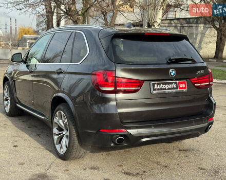 Чорний БМВ Х5, об'ємом двигуна 3 л та пробігом 110 тис. км за 28490 $, фото 2 на Automoto.ua