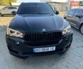 Чорний БМВ Х5, об'ємом двигуна 2 л та пробігом 86 тис. км за 39000 $, фото 1 на Automoto.ua